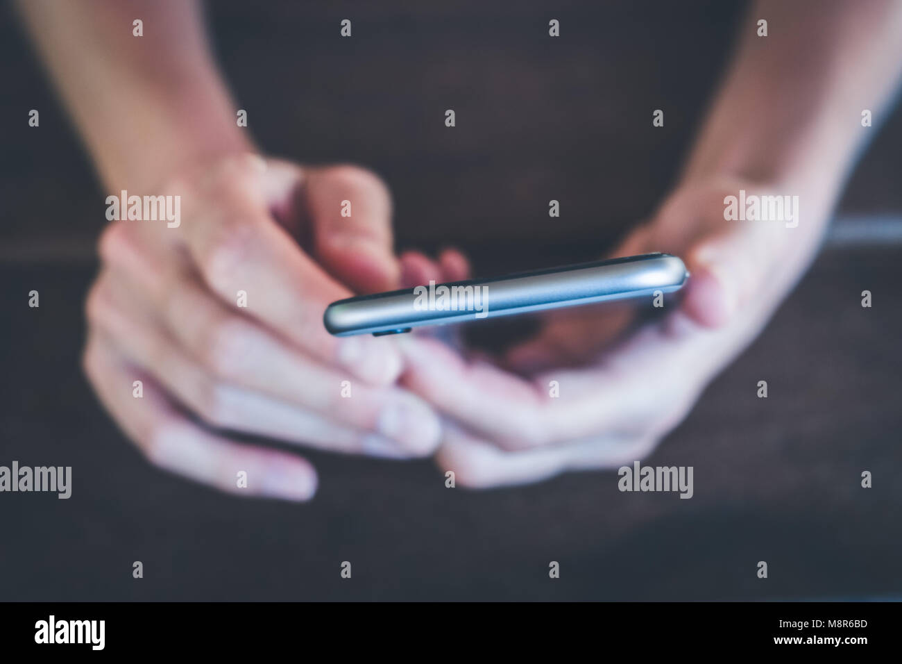 hands holding phone macro - girl uses smartphone closeup Stock Photo ...