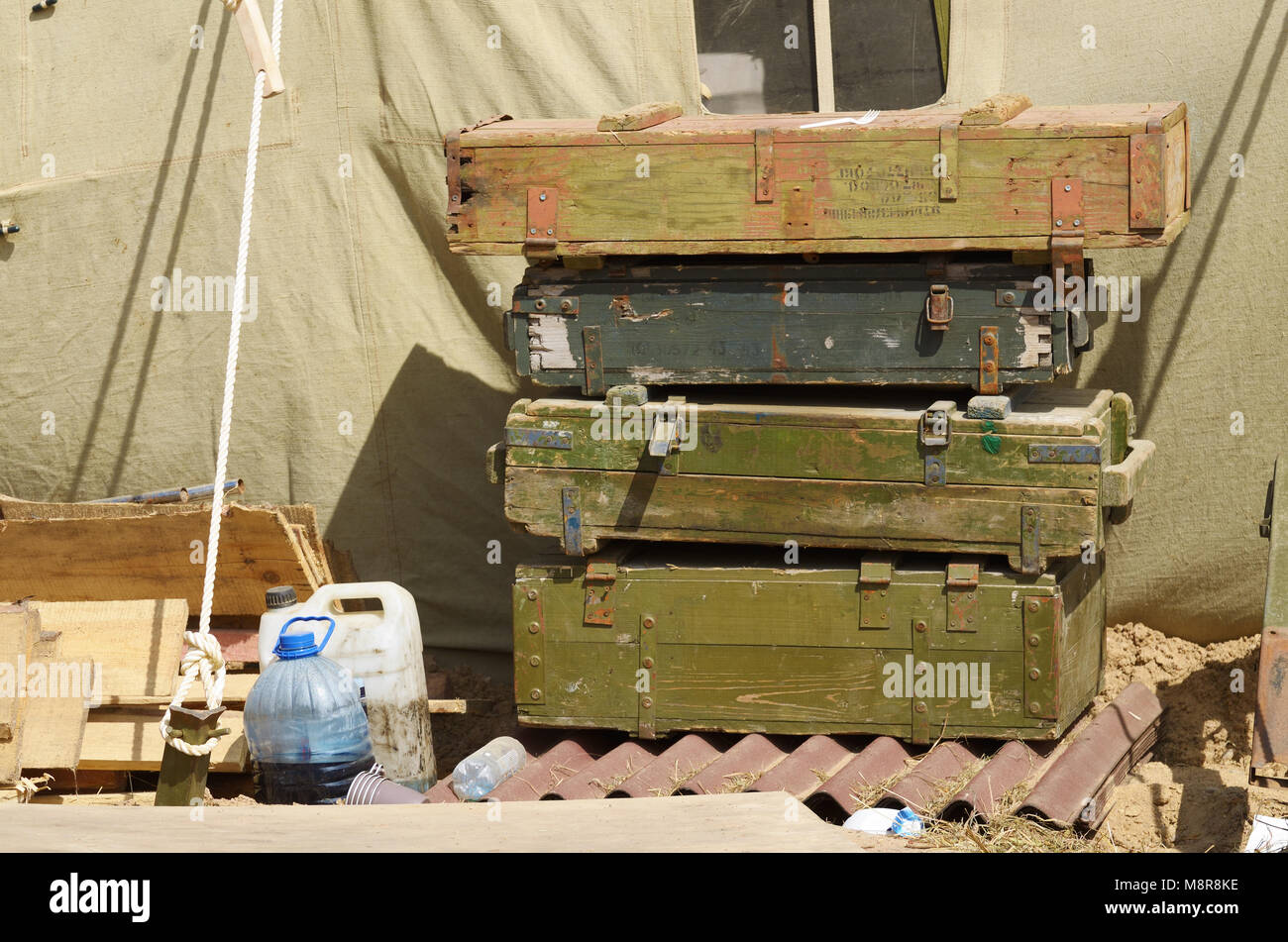 Empty boxes from under shells.Stand near a military tent. Stock Photo