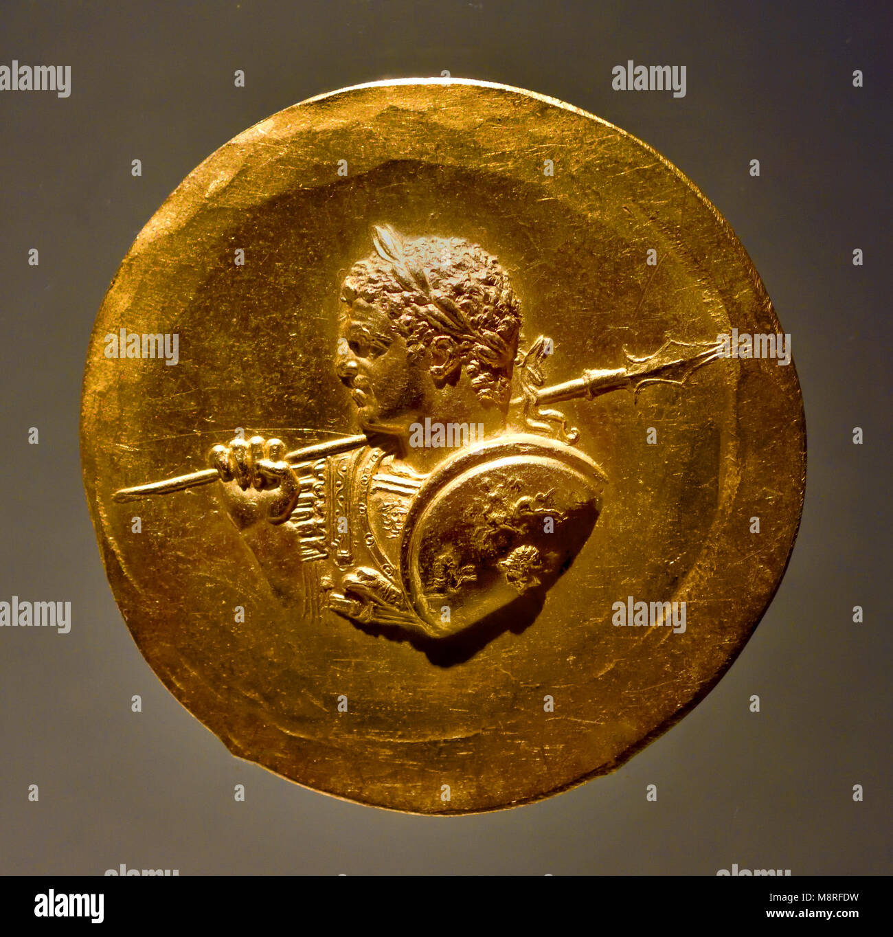 Golden Coin of  Roman emperor Caracalla ( Marcus Aurelius Severus Antoninus Augustus), formally known as Antoninus, was a Roman emperor from AD 198 to 217. Roman emperor Caracalla  with cuirassed and Laureate bust ) Stock Photo
