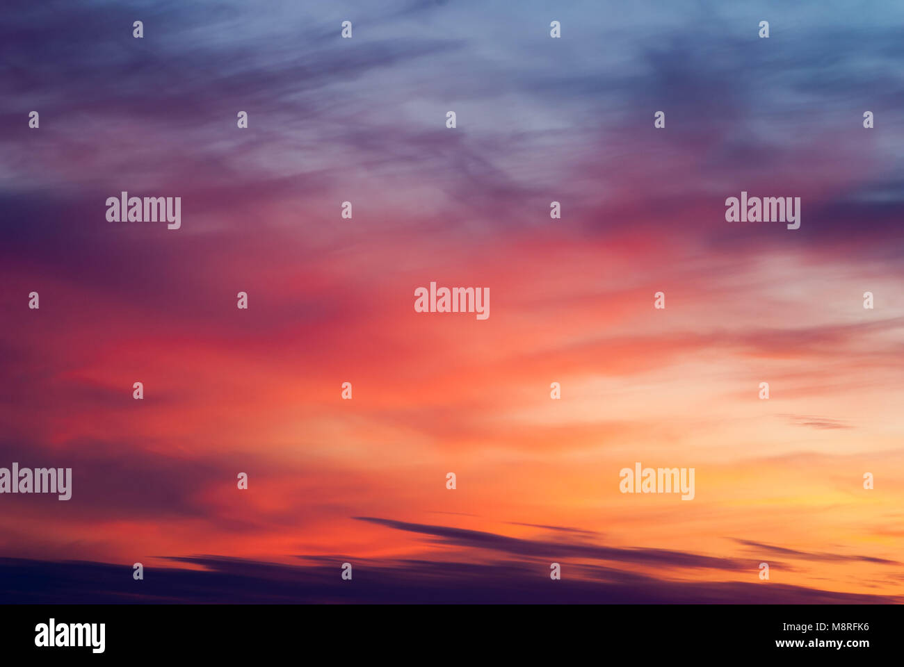 Dramatic sky at sunset, bright colored abstract clouds Stock Photo - Alamy