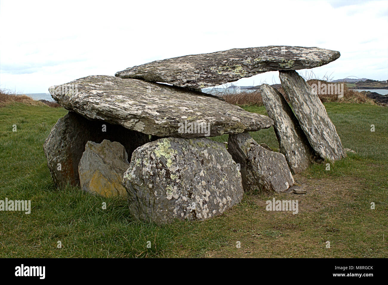 wedge tomb over 3000 years old excavated on the mizen peninsular, ireland a popular tourist and holiday destination for people passing through ireland Stock Photo