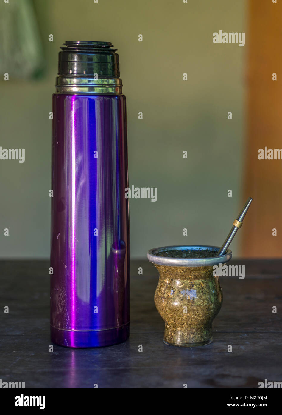 https://c8.alamy.com/comp/M8RGJM/mate-of-glass-and-violet-thermo-typical-latin-american-infusion-on-M8RGJM.jpg