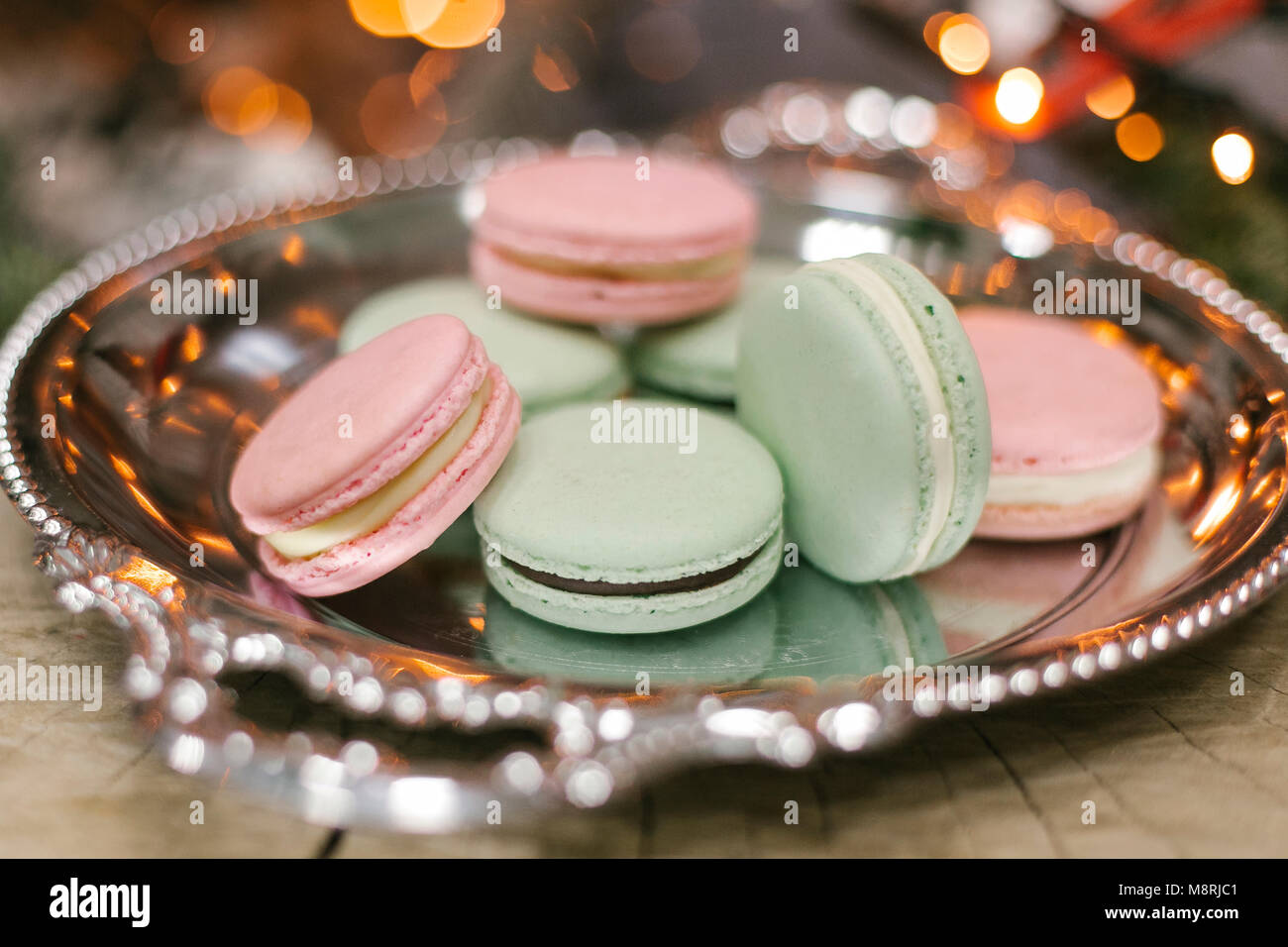 High angle view of macaroons in plate on table Stock Photo