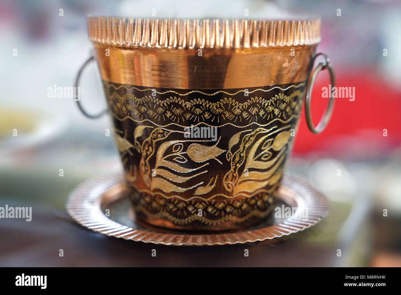 Old copper bucket with handle on blur background Stock Photo Alamy