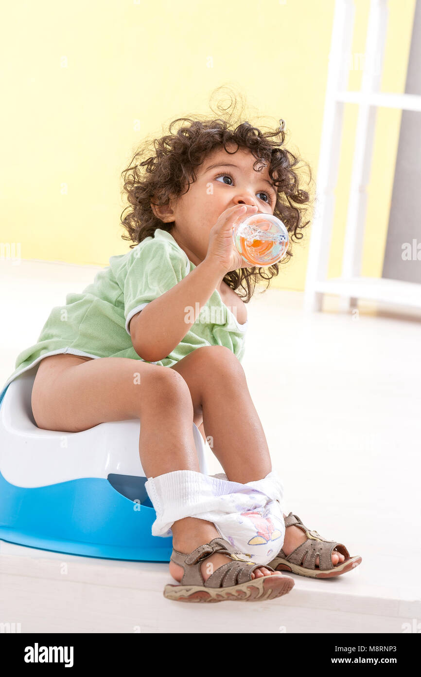 Little girl and potty, Stock Photo, Picture And Rights Managed Image. Pic.  ODI-ORE-094432