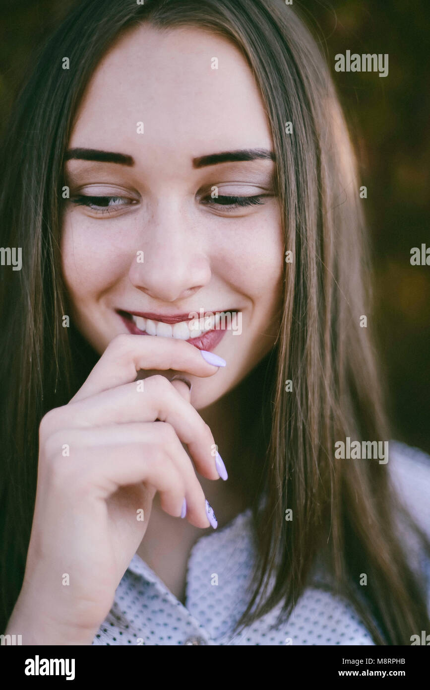Close up woman face looking down hi-res stock photography and images ...