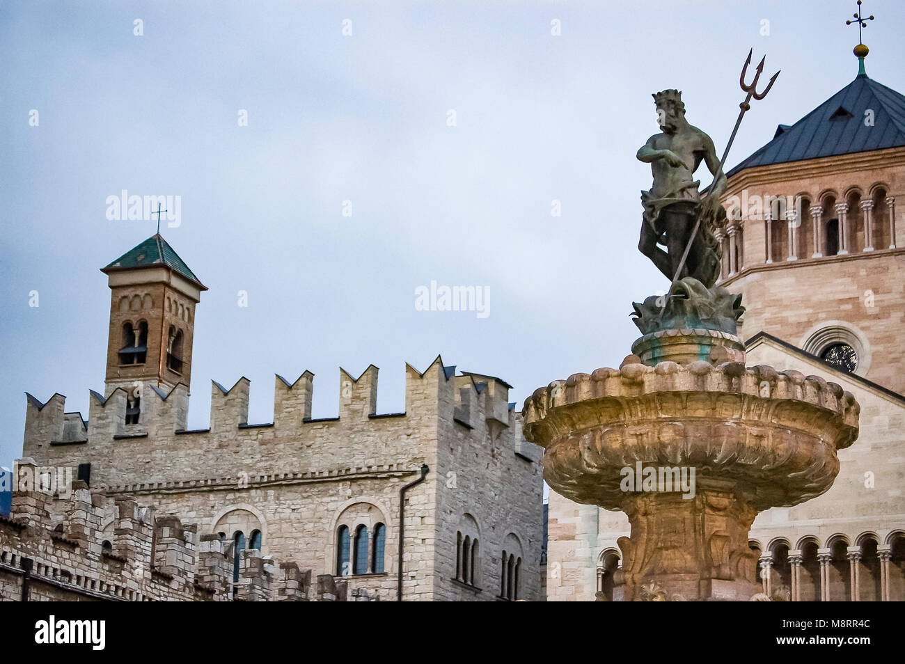 Main square Piazza Duomo, with clock tower and the Late Baroque Fountain of Neptune. City in Trento Italy Stock Photo