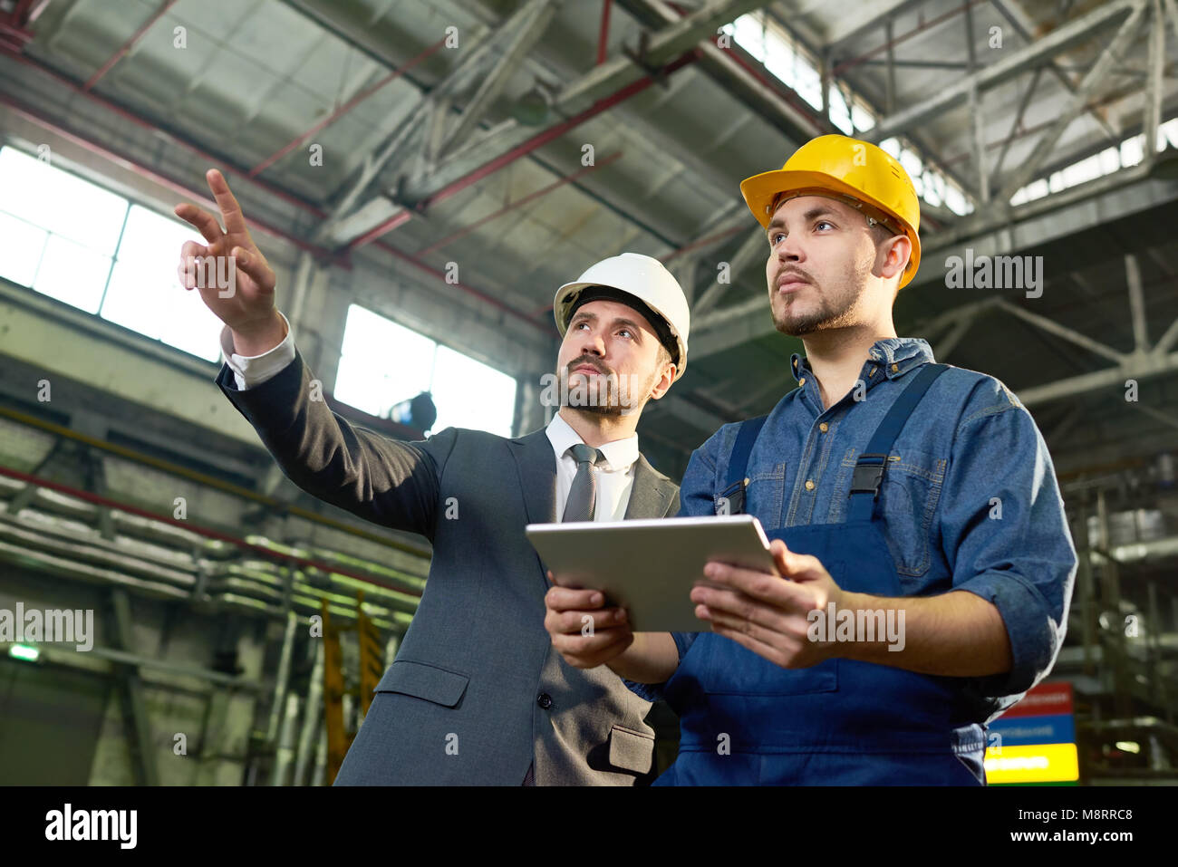 Engineers Planning at Factory Stock Photo Alamy