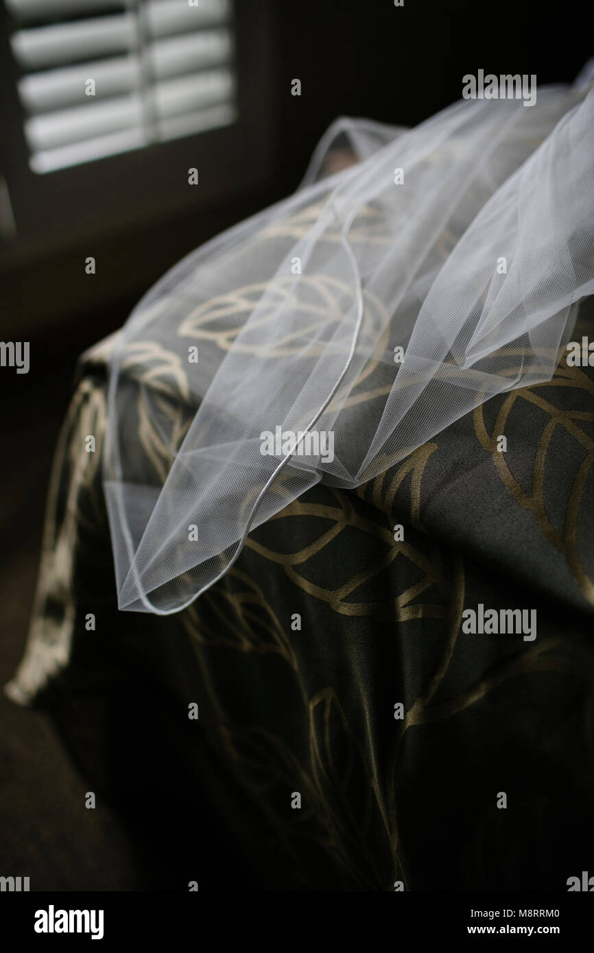 High angle view of veil on bed at home during wedding ceremony Stock