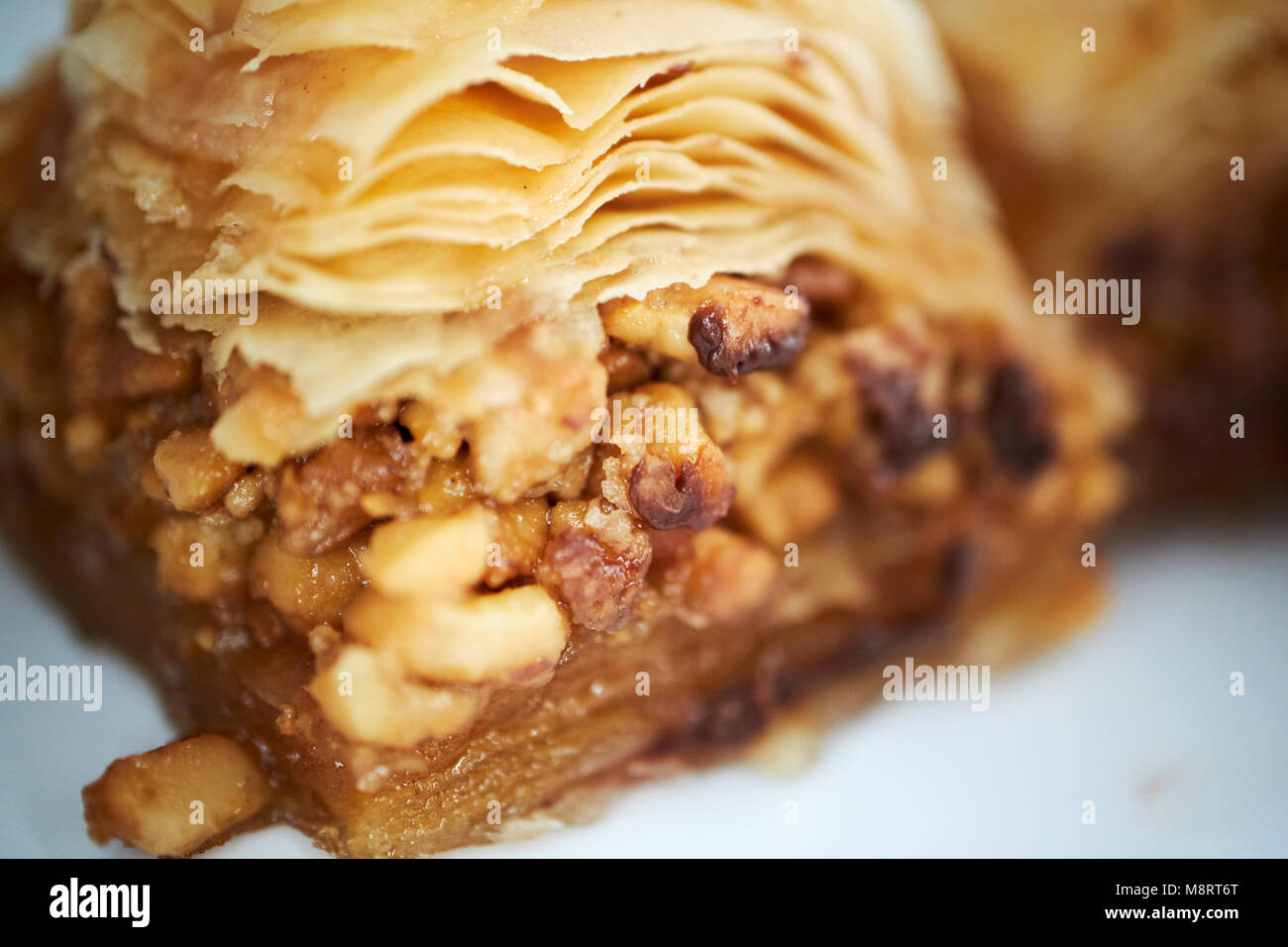 baklava chopped nuts in syrup sandwiched between filo pastry Stock