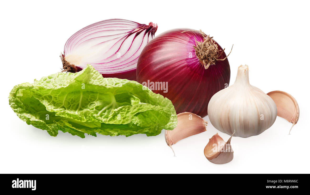 Whole fresh unpeeled red onion with half, garlic with cloves and green ...