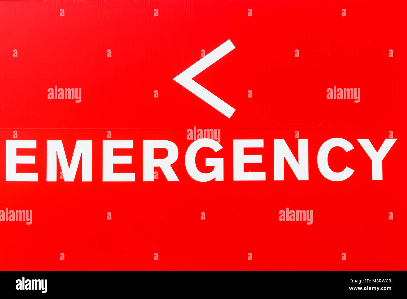 Red Emergency Entrance Sign for a Local Hospital I Stock Photo