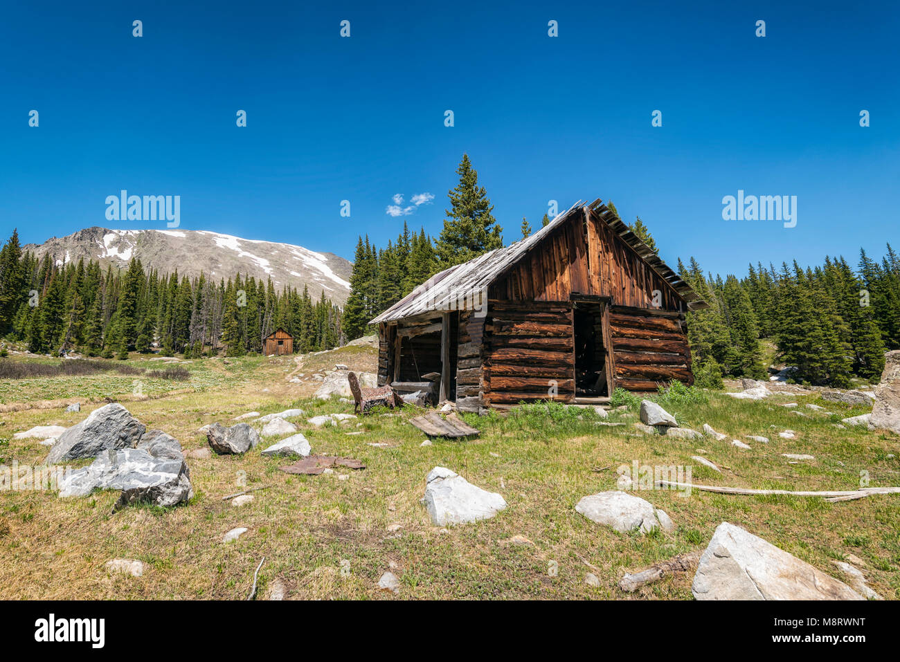 Log Cabin On Field Against Blue Sky Stock Photo 177546036 Alamy