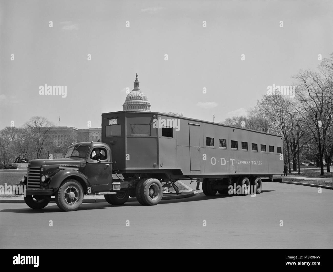 New Oversized Trailer Designed and Built by the Office of Defense Transportation and War Production Board (WPB) officials with the Cooperation of Private Companies, Made Entirely of Non-Critical Materials, used to Transport Defense Workers to Outlying Industrial Plants, Washington DC, USA, by Albert Freeman for Office of War Information, March 1942 Stock Photo