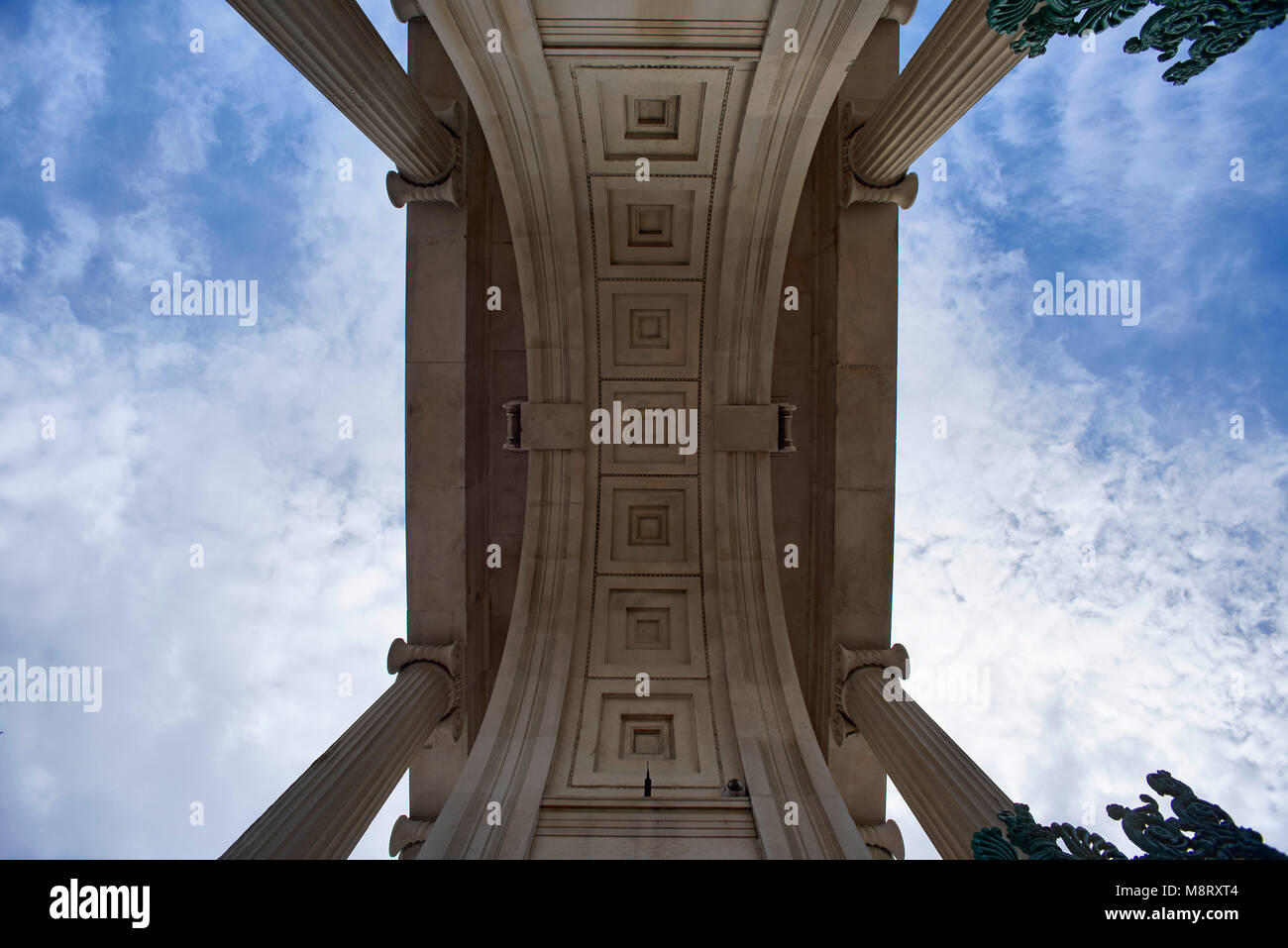 Directly below shot of Triumphal Arch against sky Stock Photo