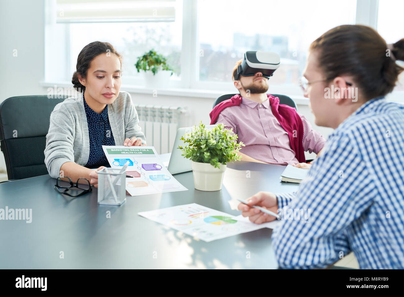 Managers discussing project Stock Photo - Alamy