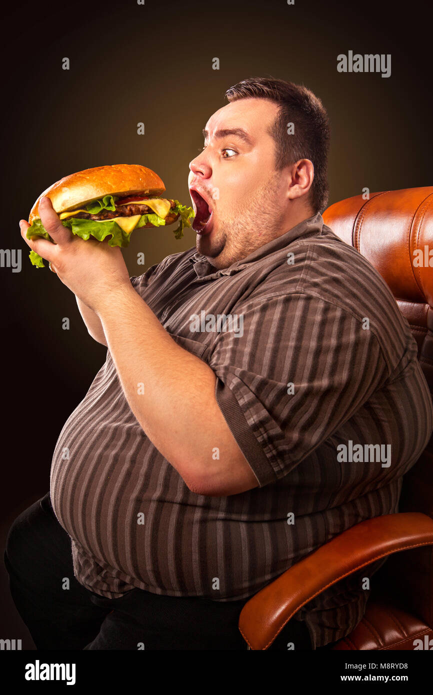 Fat Man Eating Fast Food Hamberger Breakfast For Overweight Person Stock Photo Alamy