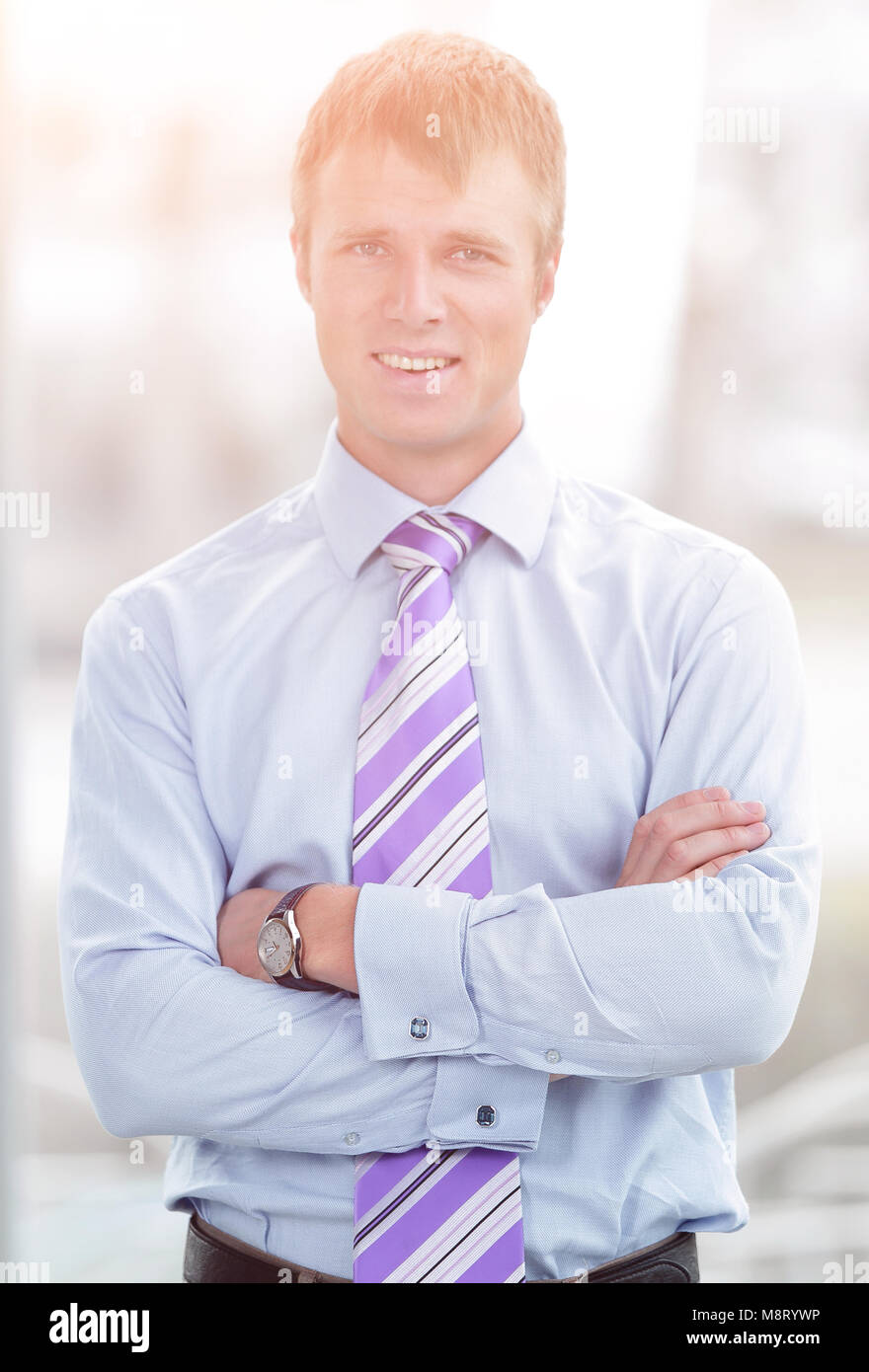 Portrait of a businessman with arms crossed Stock Photo - Alamy