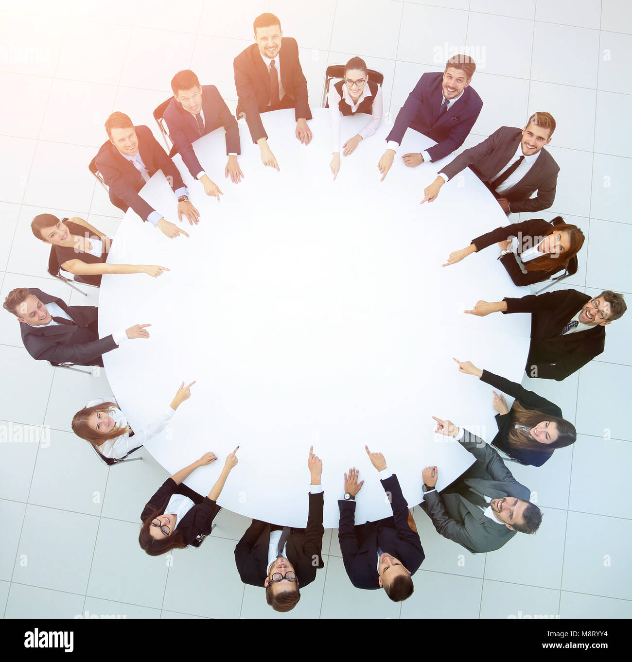 group of business people sitting at the round table. the busines Stock ...