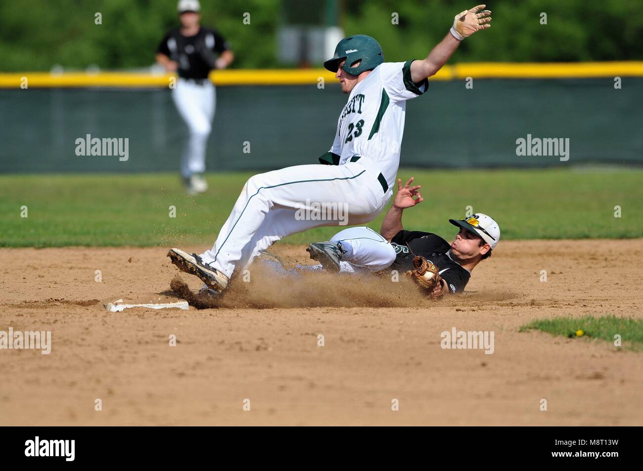 After catch a throw from his catcher a second baseman is unable to