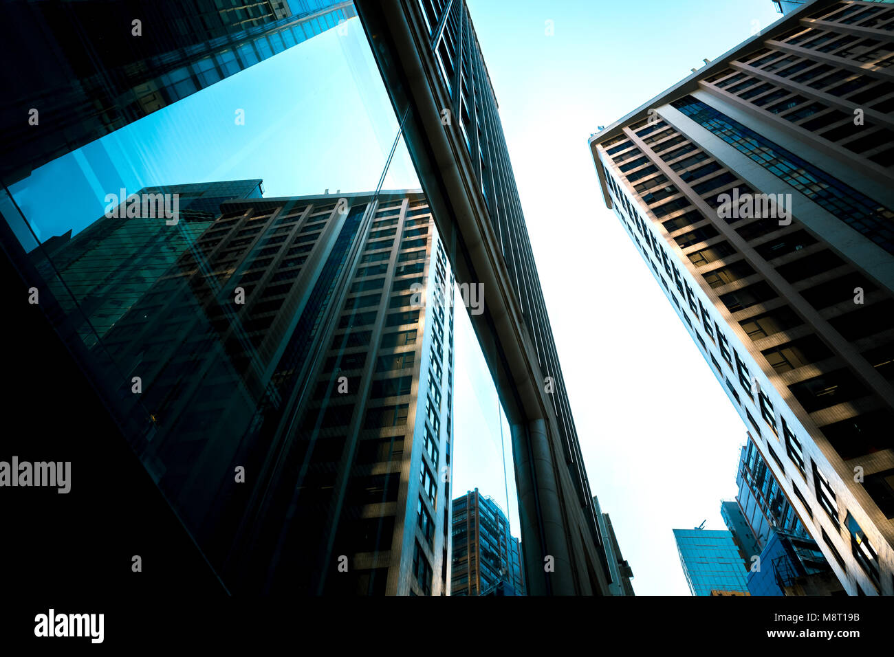 Bottom up view of Modern office building in Hong Kong Stock Photo - Alamy