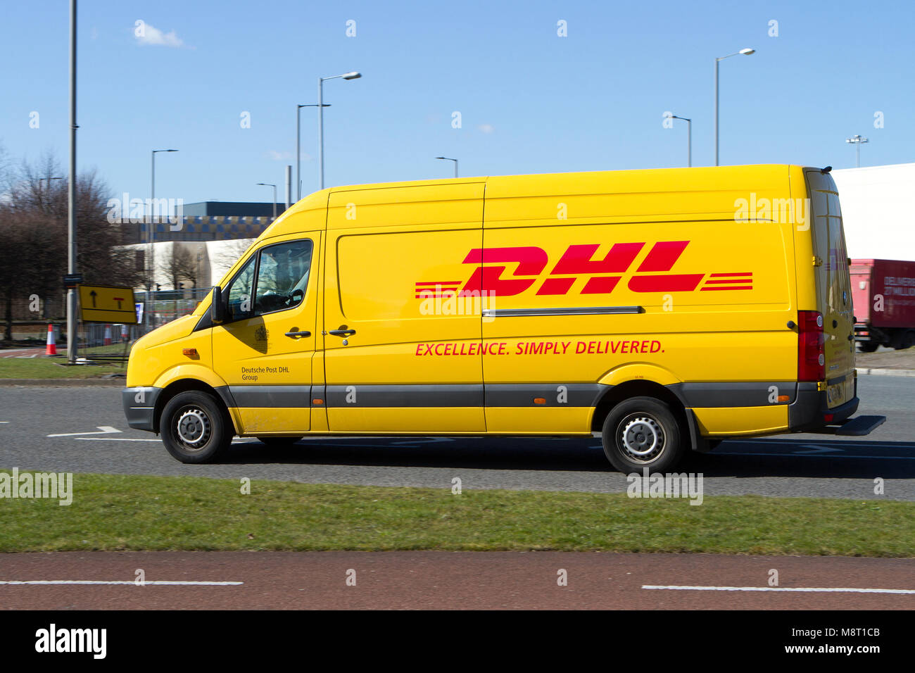 a dhl express parcel delivery van courier package parcels transport ...