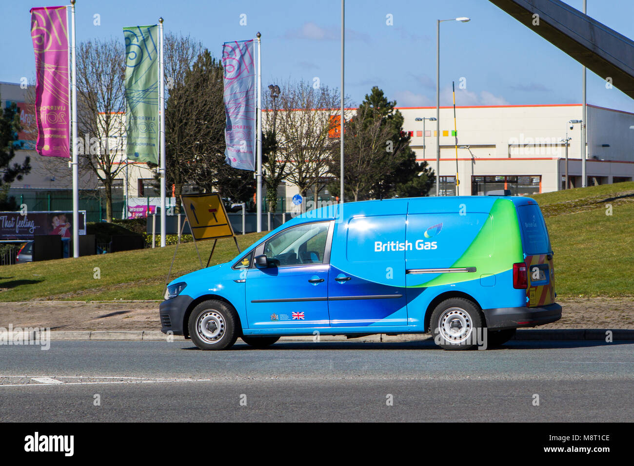 British gas engineer, blue van logo transport, utility utilities fuel service company vehiucle, UK Stock Photo