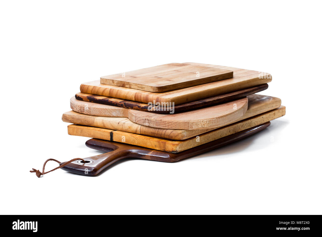 Stack of used cutting boards isolated on white Stock Photo Alamy