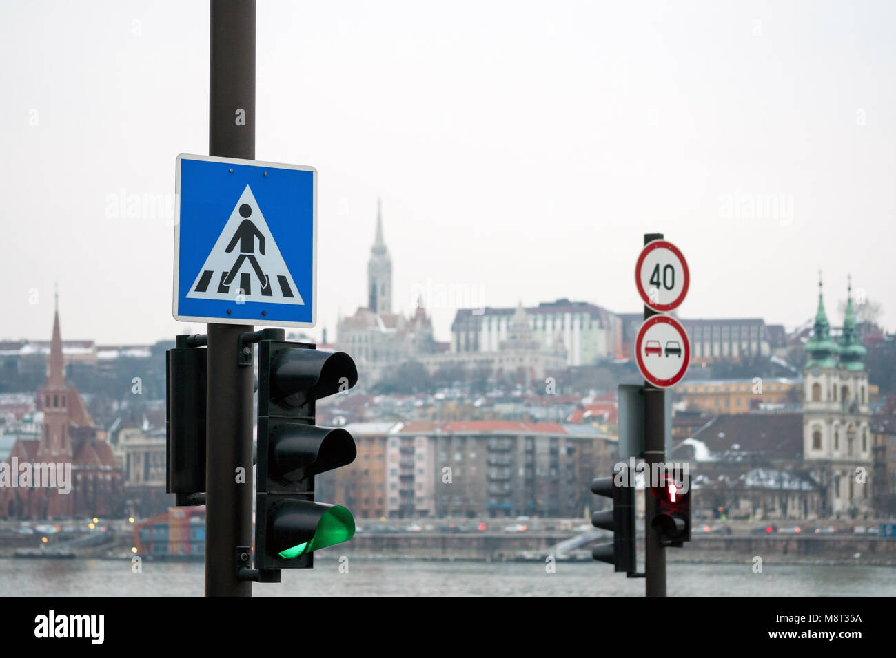 Semaphores with pedestrian crossing sign and speed limit sign in Budapest, Hungary Stock Photo