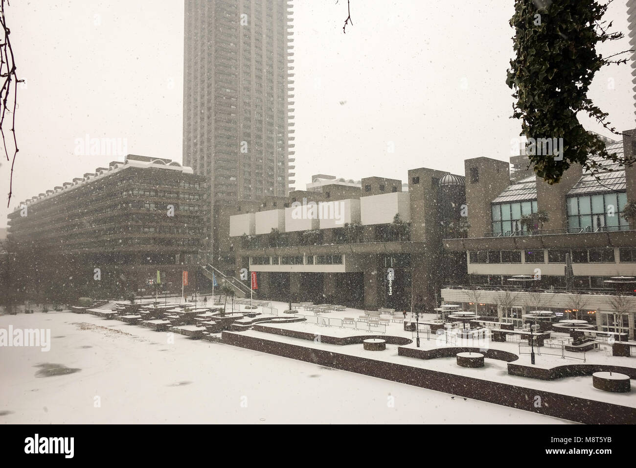 LONDON, UK -28th Feb 2017: Heavy snow falls across the Barbican Centre caused by snow storm Emma. Stock Photo