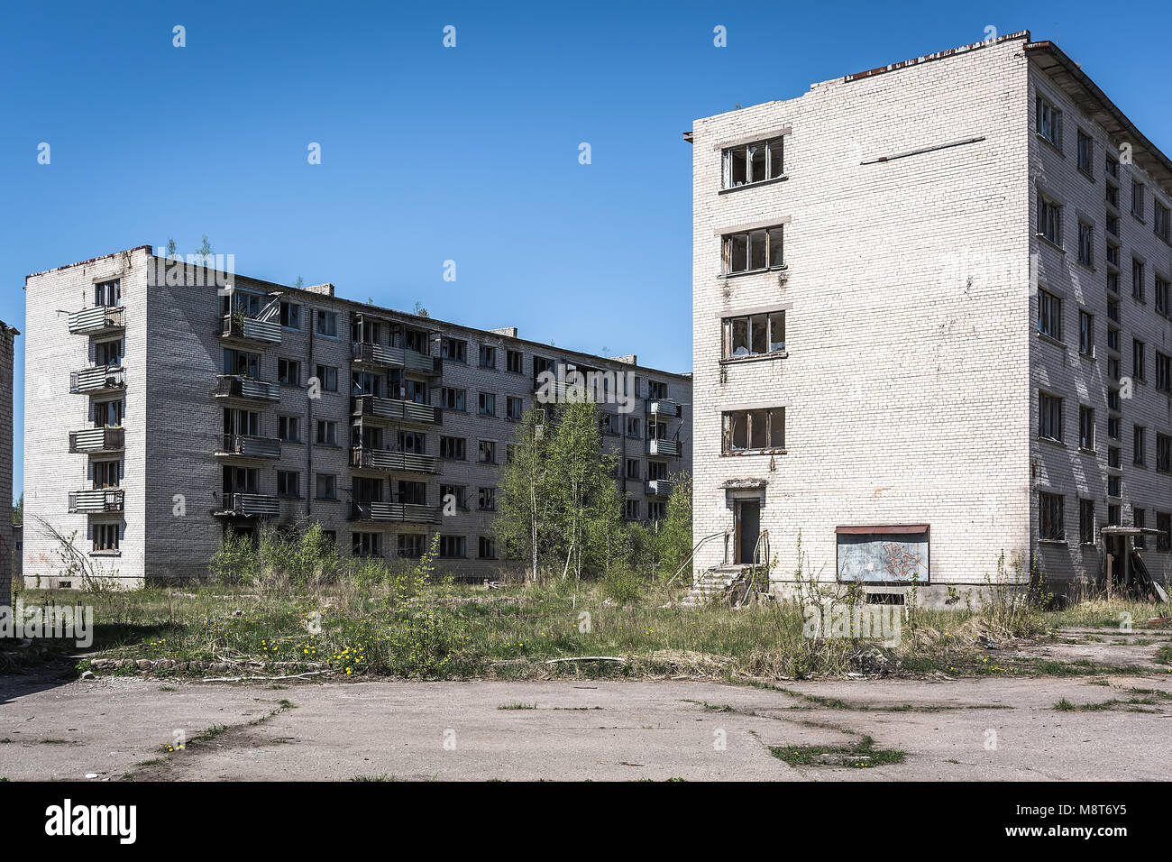 Runed post apocalyptic soviet apartment blocks in Skrunda, Latvia Stock Photo