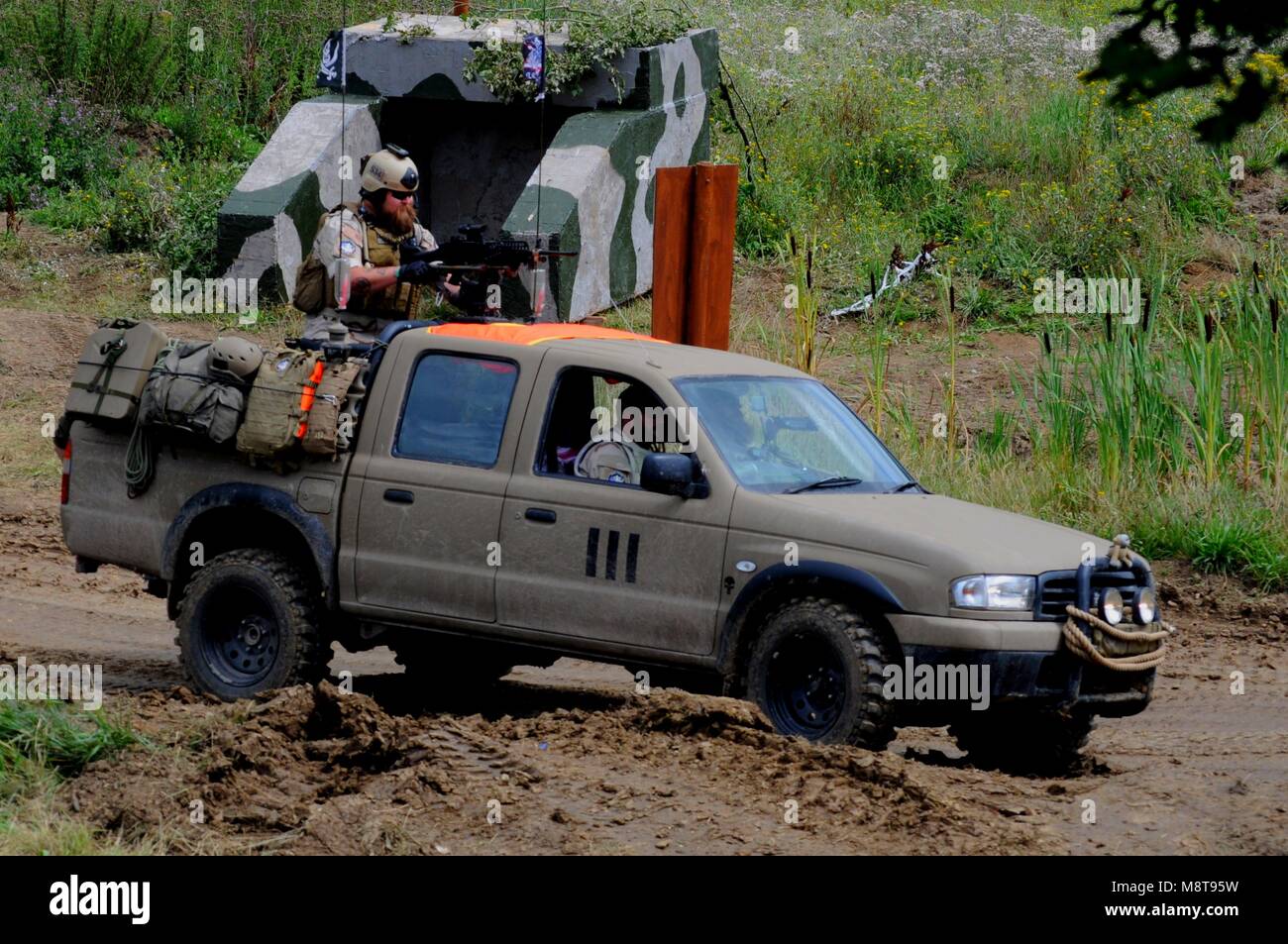 Re-enactors with Toyota Hilux 'technical' as used by Delta Force at 2017 War and Peace Revival at Hop Farm near Paddock Wood, Kent, UK. Stock Photo