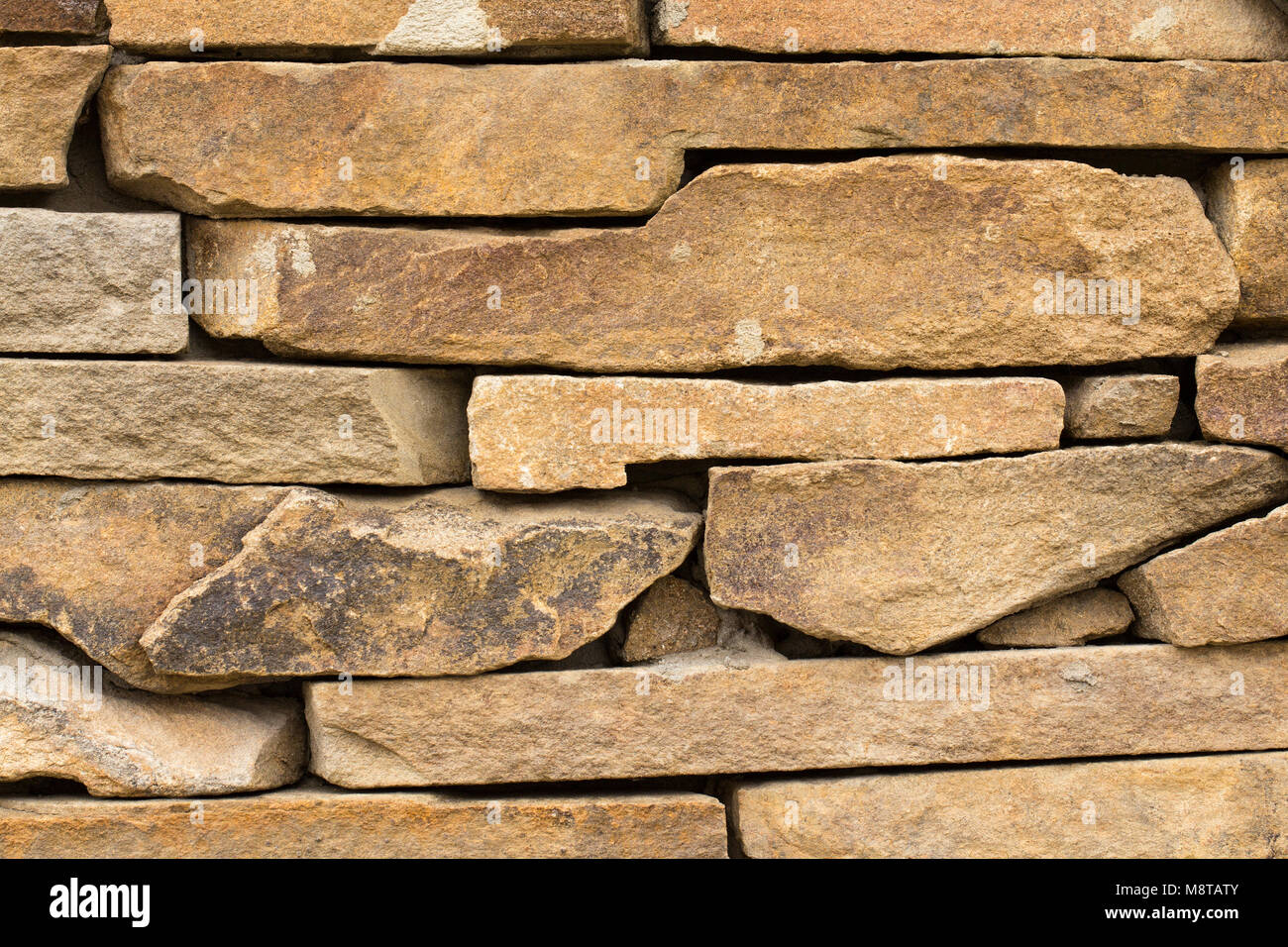 Stone wall background old wall background close up Stock Photo - Alamy