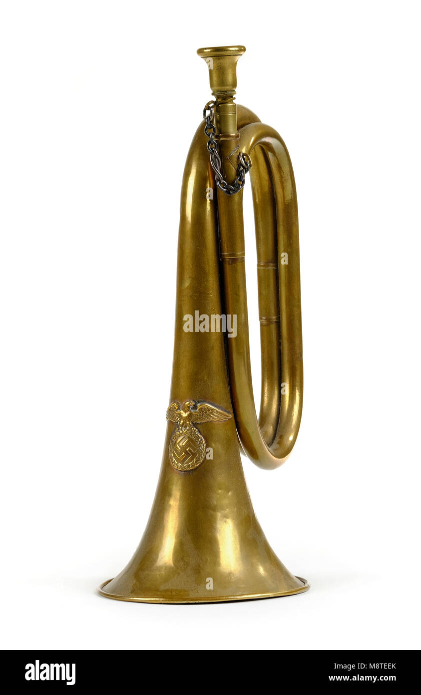 German Third Reich brass bugle featuring the Eagle and Swastika Stock Photo