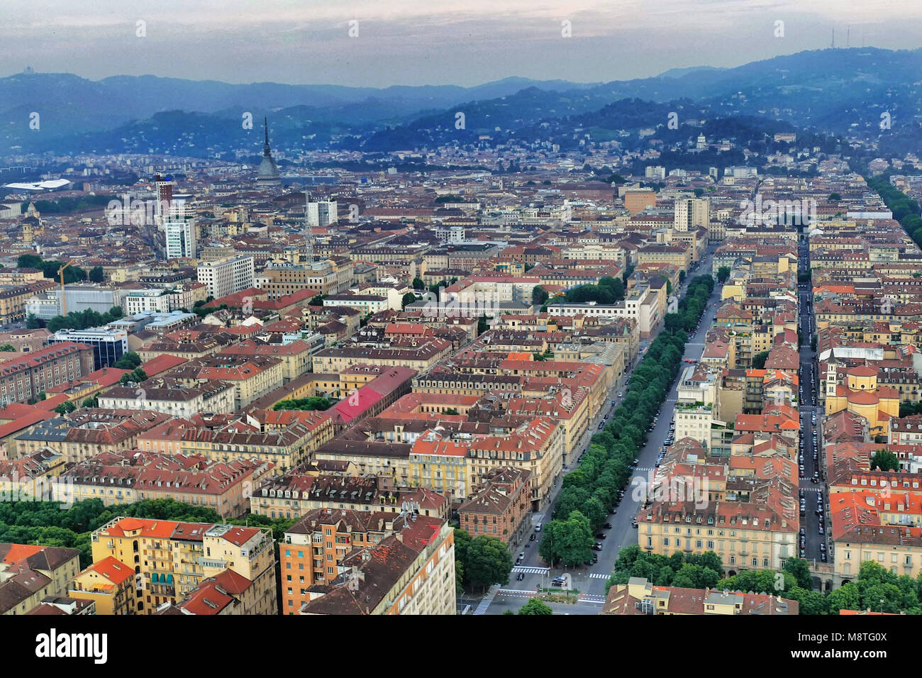 Aerial drone view of the city downtown and surrounding hills at sunset Turin Italy july 13 2016 Stock Photo