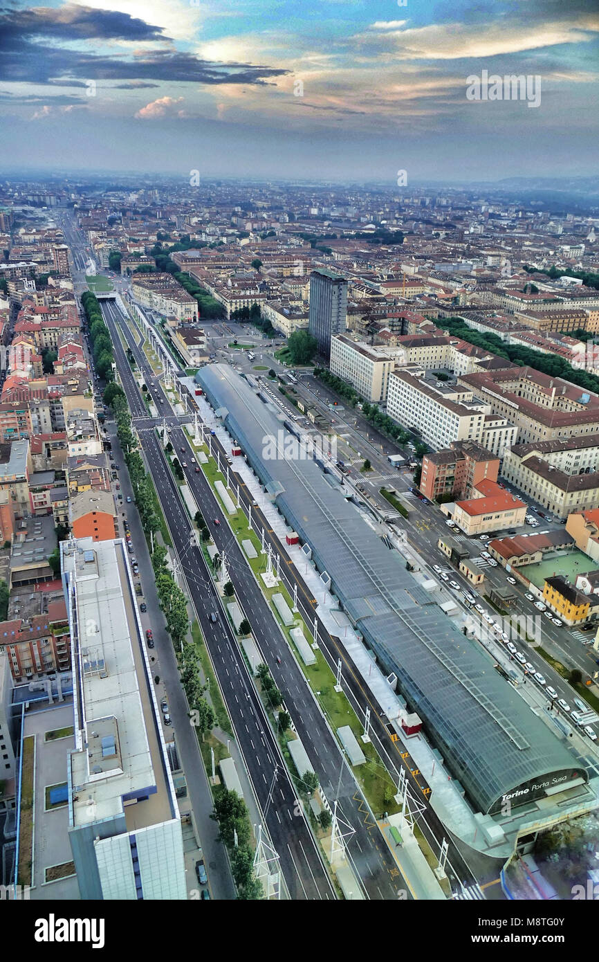 Aerial drone view of the city and Porta Susa station in foreground at sunset Turin Italy july 13 2016 Stock Photo