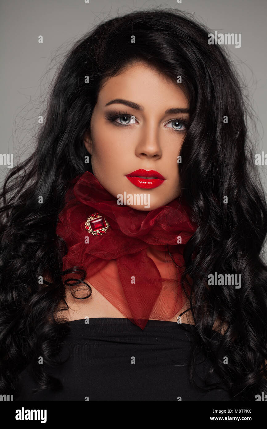 Fashion Model With Long Permed Hair Portrait Stock Photo
