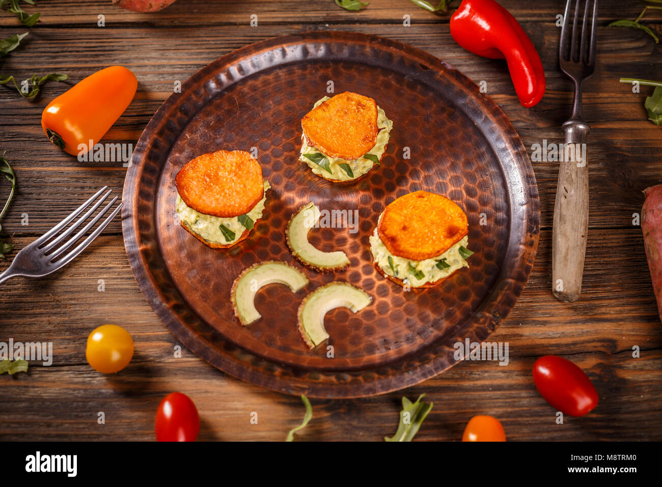 Avocado cream on sweet potato toast, helathy homemade appetizer Stock Photo