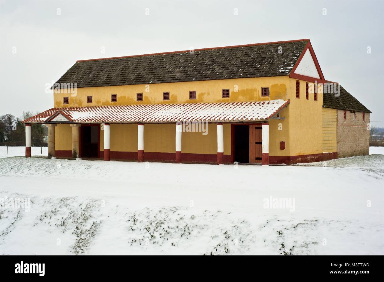 Wroxeter Roman villa in Shropshire England. Reconstructed Roman House in the snow. Stock Photo