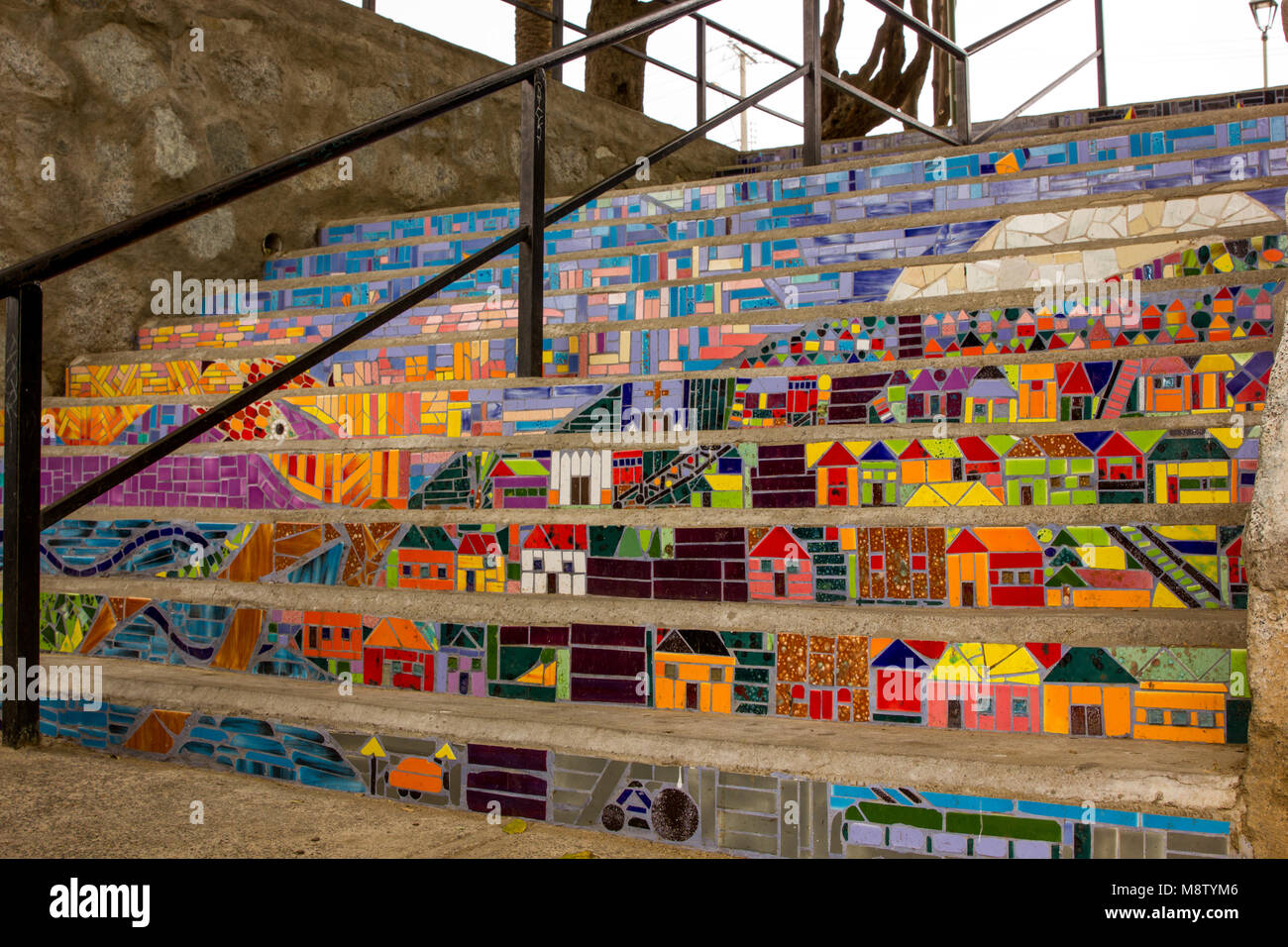 Colorful mosaic steps that replicate the cities hillside community lead to a park in Valparaiso, Chile in South America Stock Photo