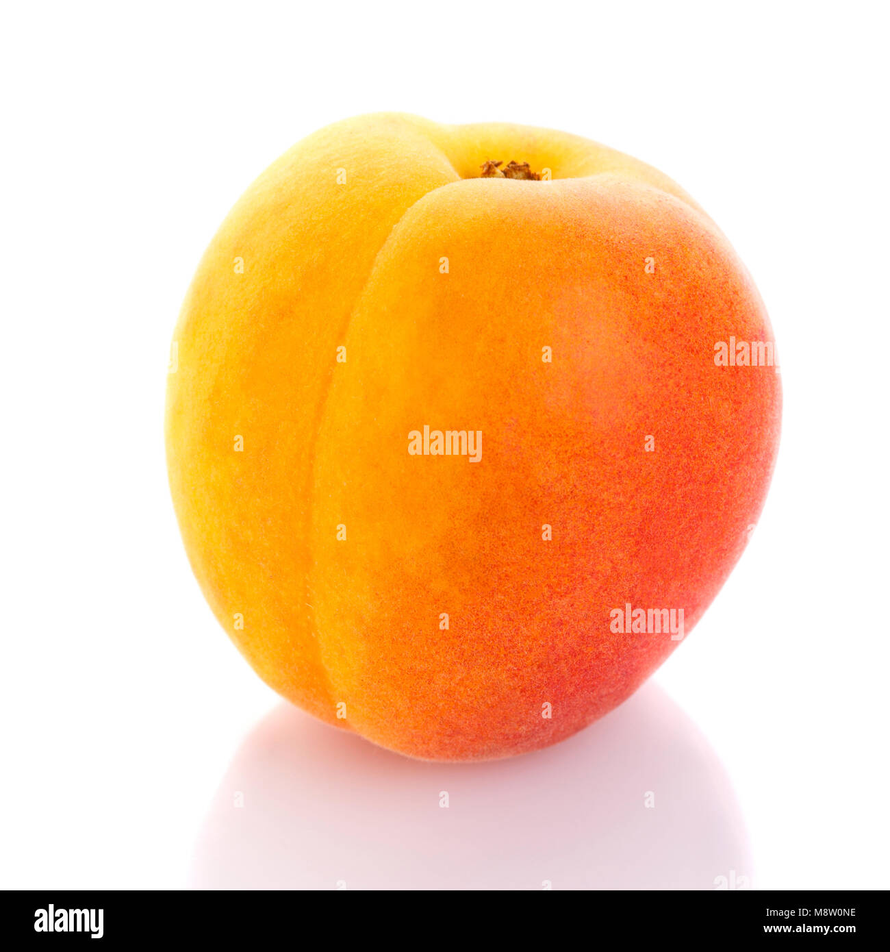 Isolated peach. One peach on white background Stock Photo - Alamy