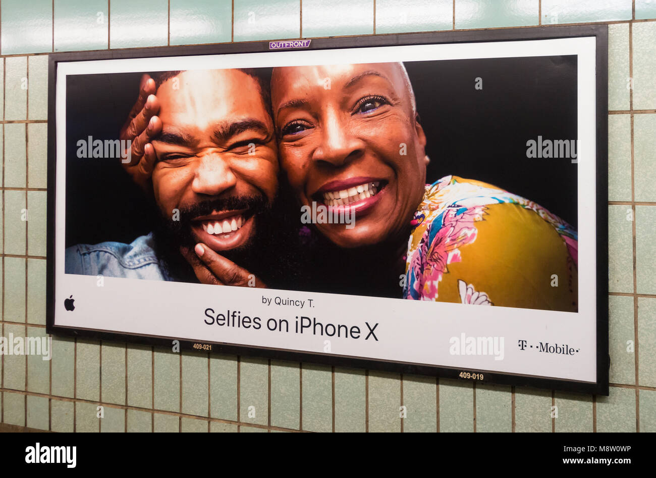 iPhone ads in the Spring Street Subway station promoting selfies made with the iPhone X (10) Stock Photo