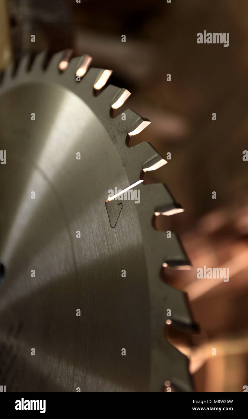 sharp teeth of the saw blade in close-up, the fragment Stock Photo