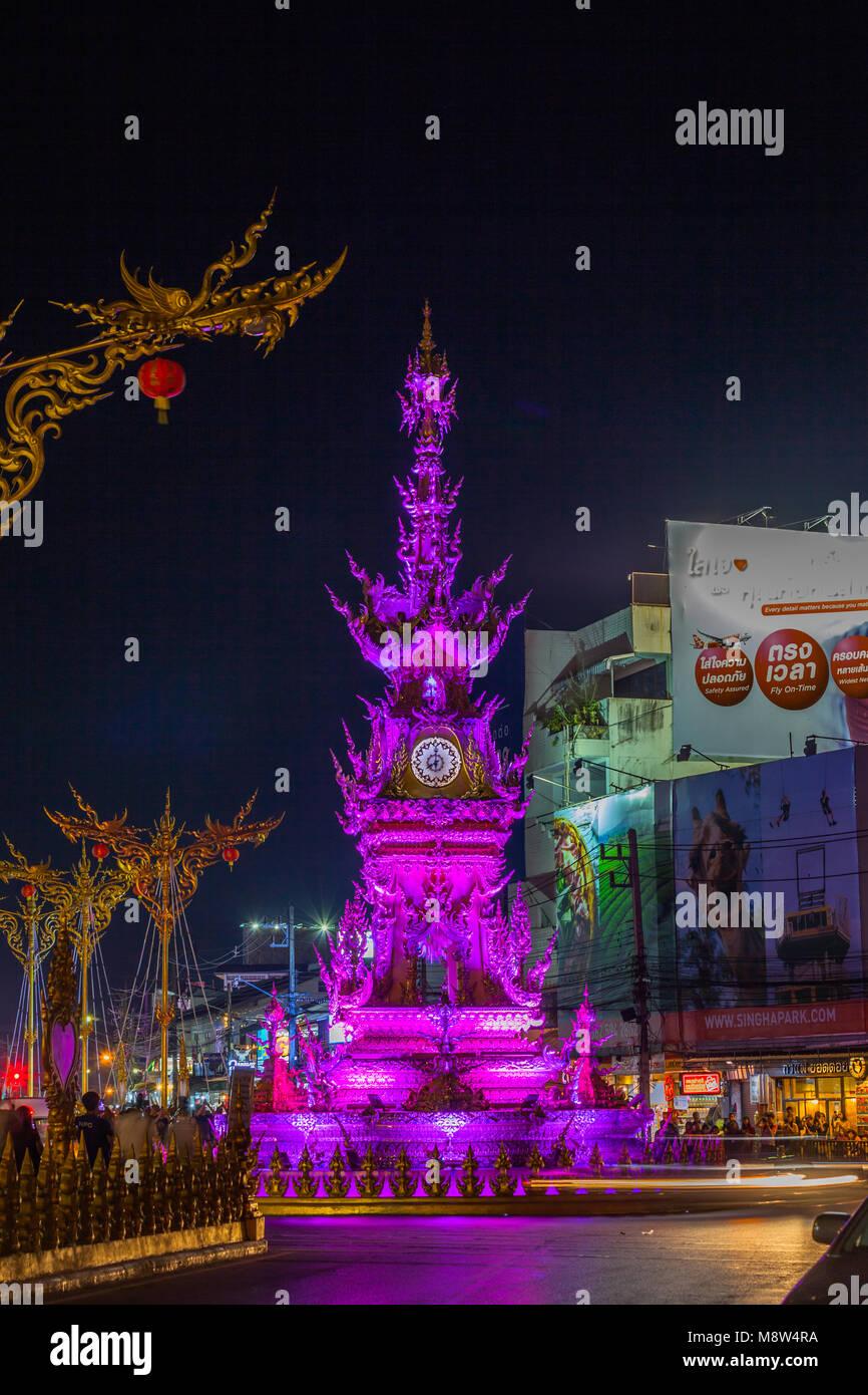 sunset at clock tower in Chiang Rai town. beautiful sculpture clock tower in central of Chiang