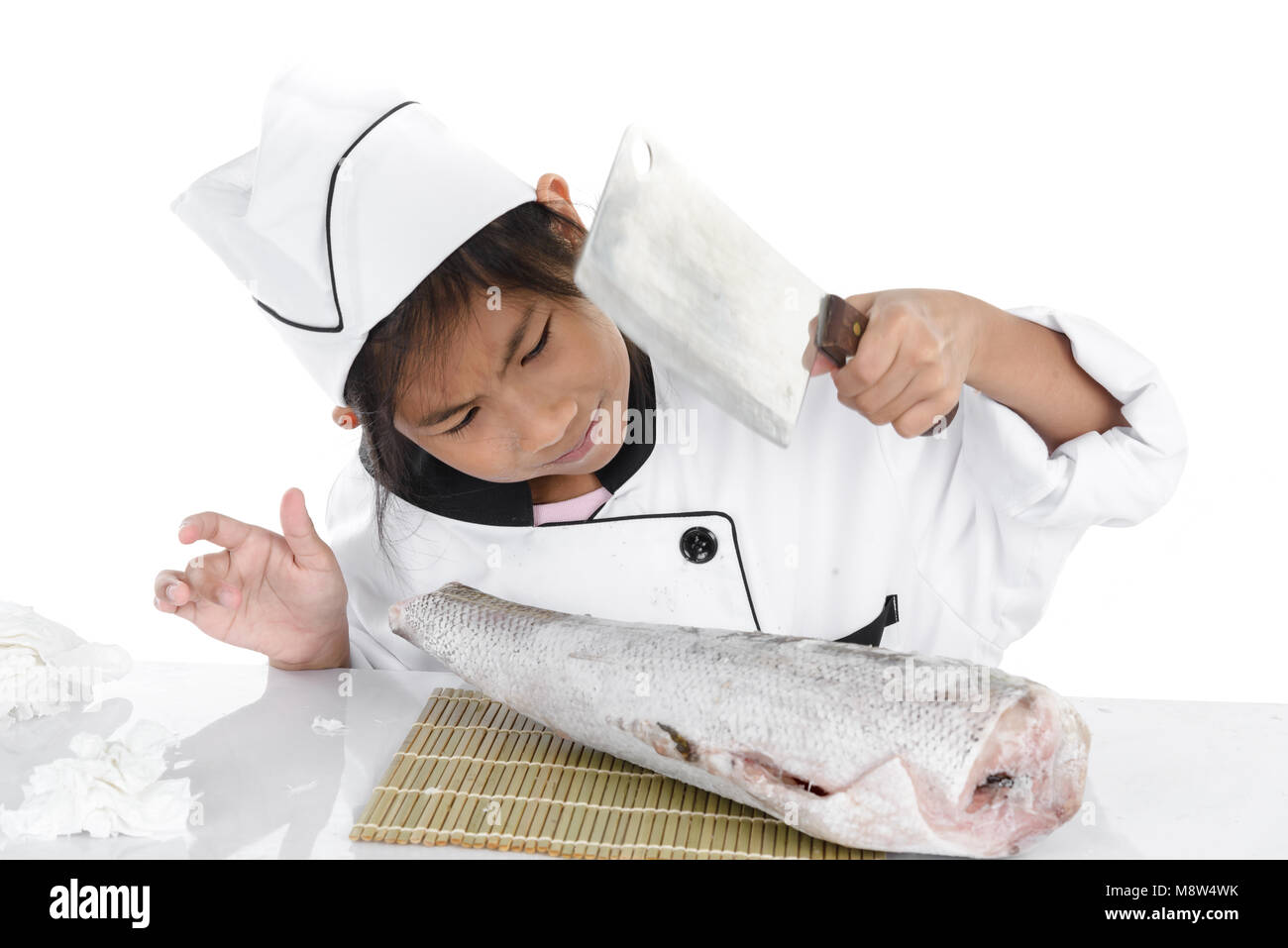 Uniform Japanese chef looking big freezing fish on white background. Stock Photo