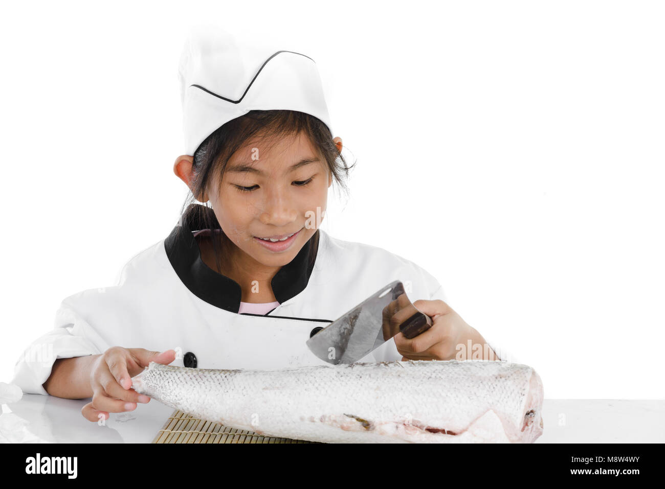 Uniform Japanese chef looking big freezing fish on white background. Stock Photo