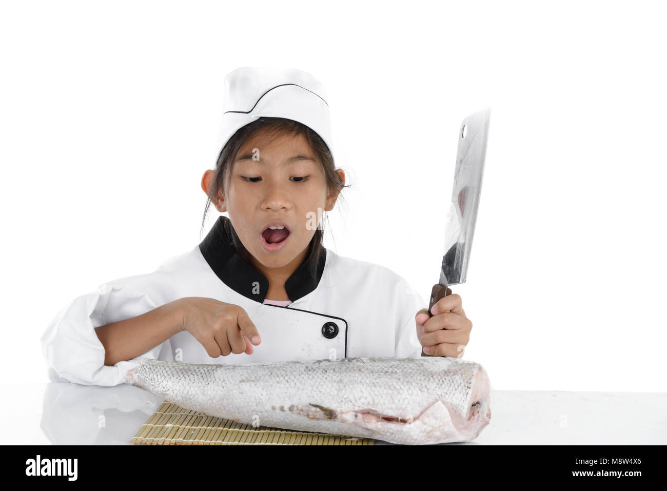 Uniform Japanese chef looking big freezing fish on white background. Stock Photo