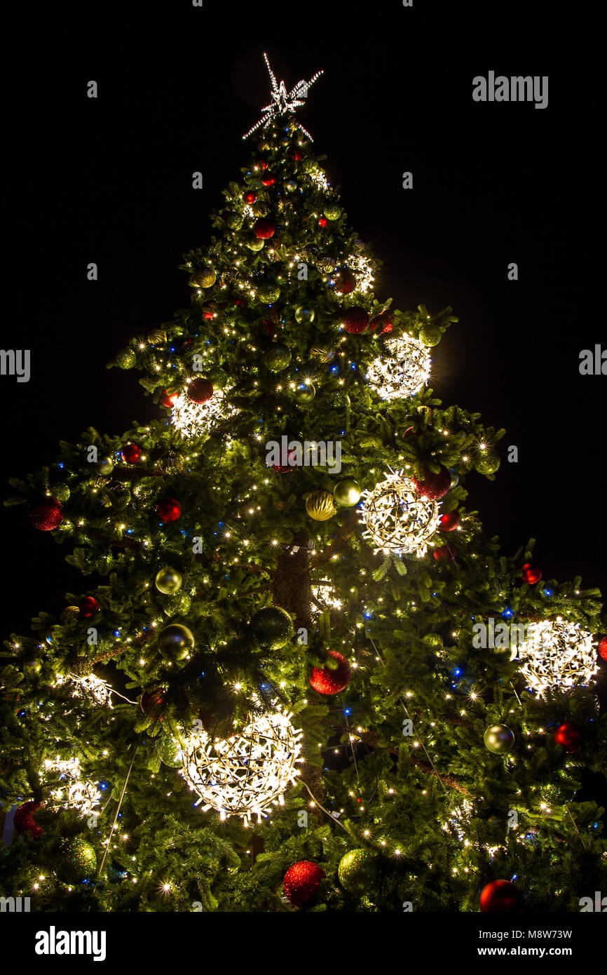 Christmas tree with decoration on black