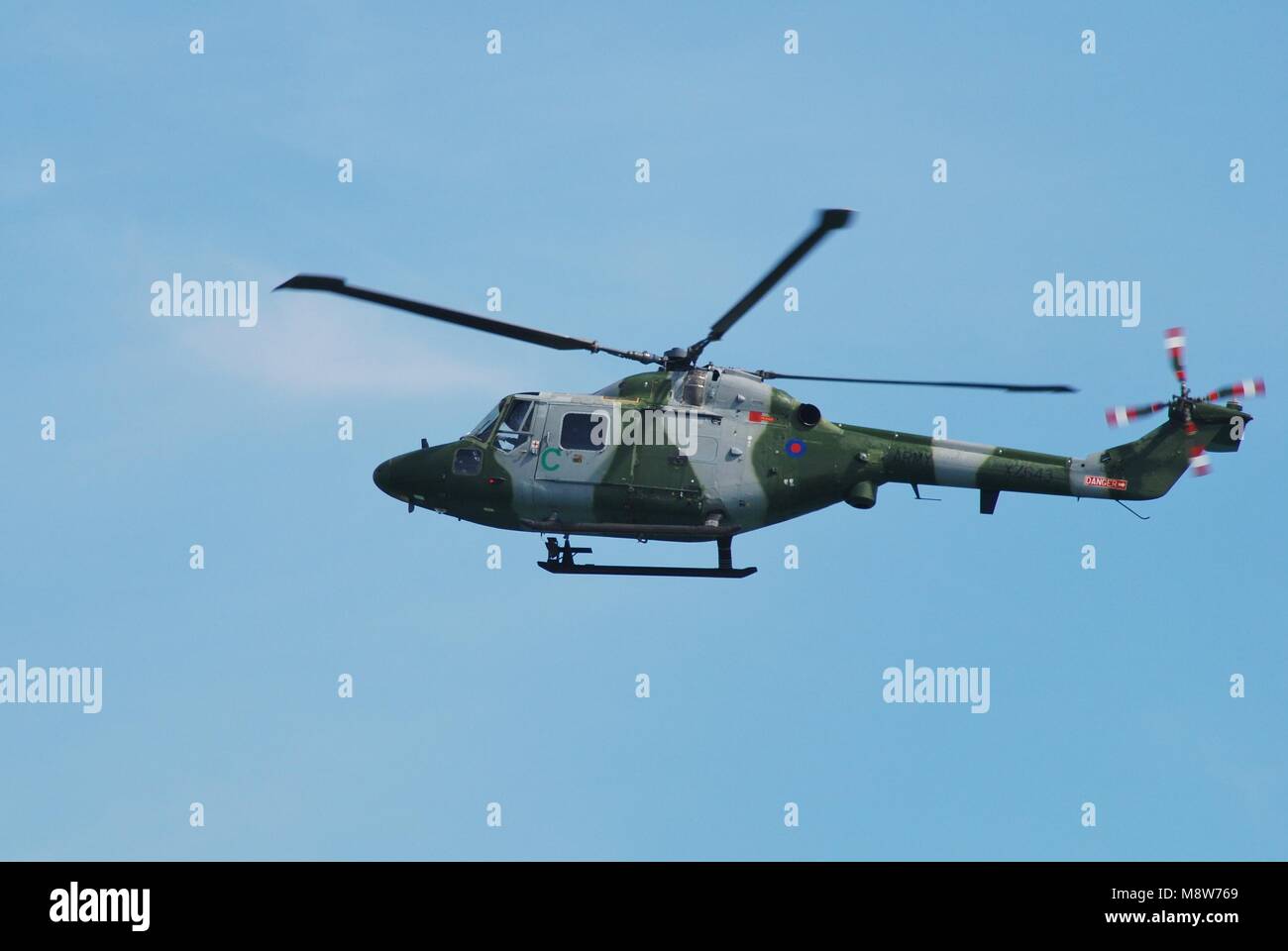 A Westland Lynx AH.7 helicopter of the British Army Air Corps (AAC) performs at the Airbourne airshow at Eastbourne, England on August 11, 2012. Stock Photo