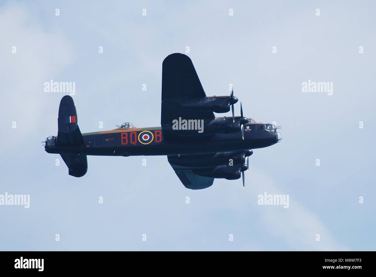 Avro Lancaster PA474 of the Battle of Britain Memorial Flight performs at the Airbourne airshow at Eastbourne, England on August 11, 2012. Stock Photo